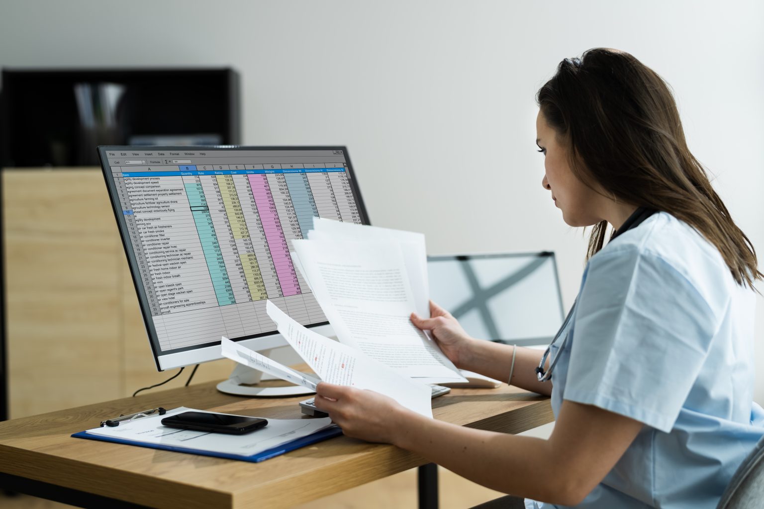 Woman performing medical coding and billing